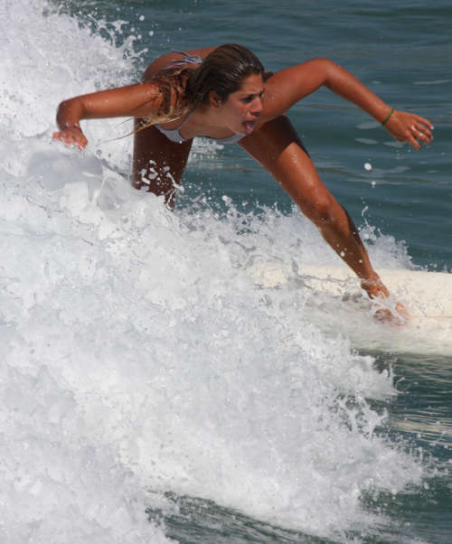 Naked surfer girl